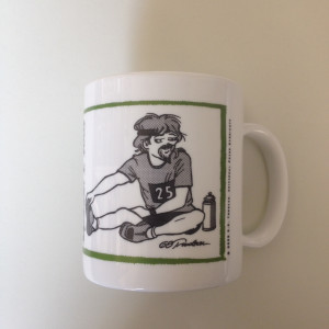 "25th Anniversary New Haven Road Race" -- Collector's mug by Garry Trudeau 