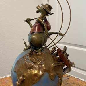 JACINTHE LACROIX. MASTER ARTIST AND SCULPTOR. NEW COLLECTOR AT THE EPCOT FESTIVAL OF THE ART OF GLOBE TROTTER TRAVELLING DRAGON by JACINTHE LACROIX. MASTER SCULPTOR AND ARTIST 