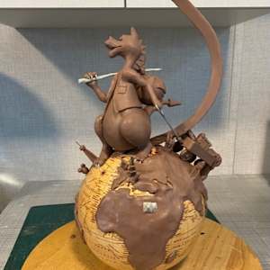 JACINTHE LACROIX. MASTER ARTIST AND SCULPTOR. NEW COLLECTOR AT THE EPCOT FESTIVAL OF THE ART OF GLOBE TROTTER TRAVELLING DRAGON by JACINTHE LACROIX. MASTER SCULPTOR AND ARTIST 