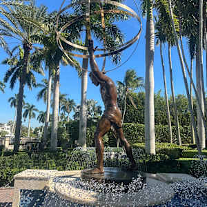 MAN WITH SPHERE-HALF LIFE SIZE by JACINTHE LACROIX. MASTER SCULPTOR AND ARTIST 