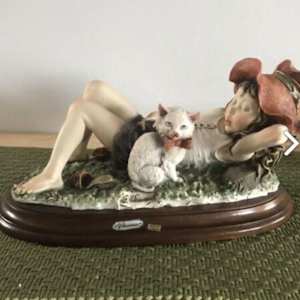 Sleeping Girl with her Cat by Giuseppe Armani