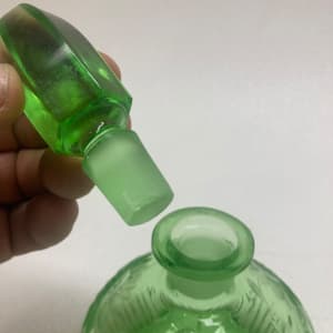 Emerald green perfume bottle by Perfume 