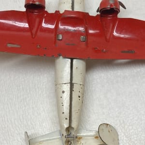 white and red Wyandotte airplane bomber 