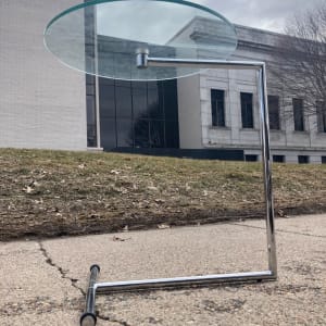 Steel chrome side table with round glass top 