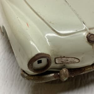 vintage toy tin Karmangia car 