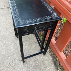 Set of 2 carved Asian accent nesting tables 