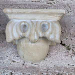 small decorative plaster carved shelf 