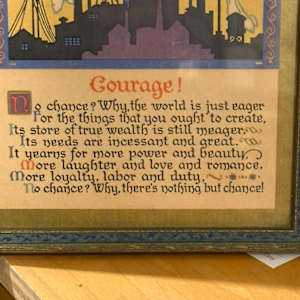 Framed motto "Courage" 