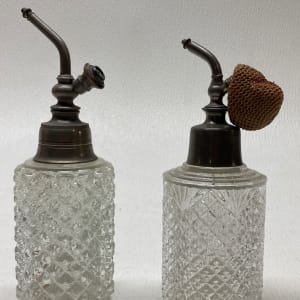 Clear perfume bottle with pewter top 