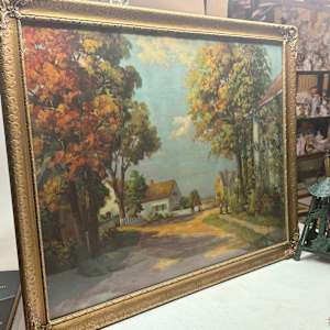 Large framed vintage lithograph of homes and street 