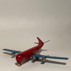 Red and blue Stratocruiser  toy airplane 