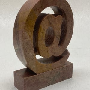 Marble bookend "@" sign