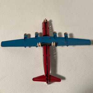 Red and blue Stratocruiser  toy airplane 