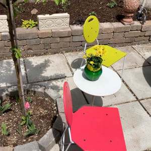 post modern chair with white iron frame and Chartreuse wooden seat 