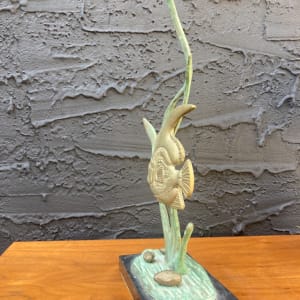 Fish sculpture on marble base 