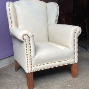 Upholstered Art Deco White leather wingback 