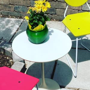 post modern chair with white iron frame and Coral wooden seat 