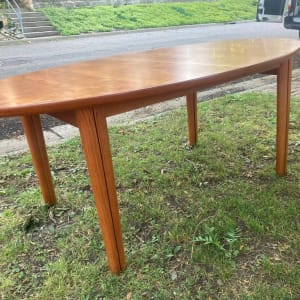 Danish modern teak dining table with 2 leaves 