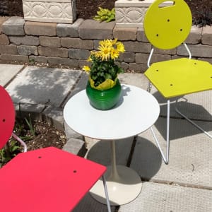 post modern chair with white iron frame and Chartreuse wooden seat 