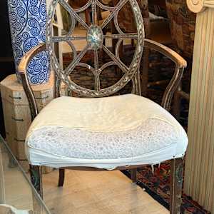 Painted chair with spider web design 