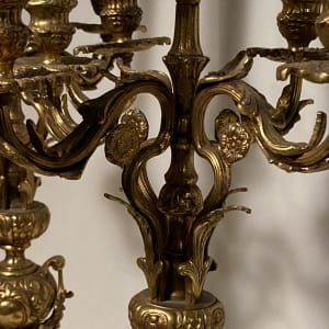 Pair of tall electrified ornate candleabra with marble bases 