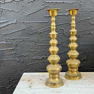 Tall brass candlesticks