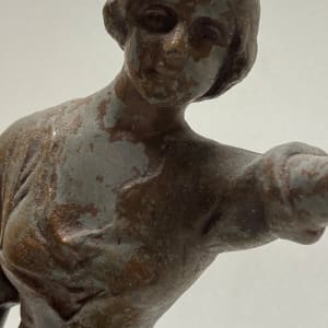 Sculptural woman carrying water 