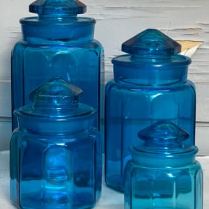 4 matching glass cannisters 