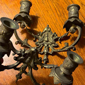 Pair of ornate brass wall mounted candelabra 