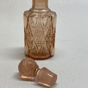 Art Deco pink pressed glass perfume bottle by Perfume 