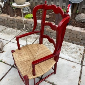 Red chair with rush seat 