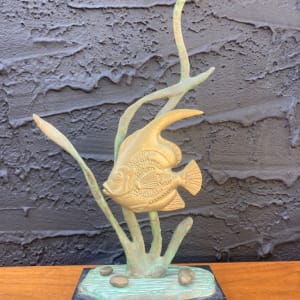 Fish sculpture on marble base 