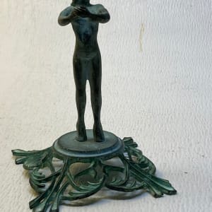 Art Deco bud vase holding metal figure 