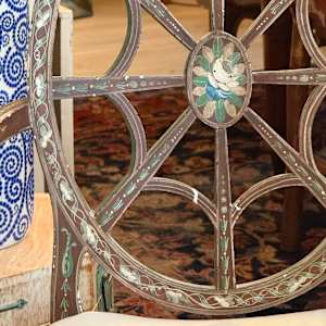 Painted chair with spider web design