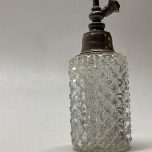 Clear perfume bottle with pewter top 