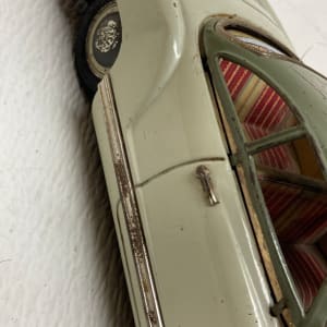 vintage toy tin Karmangia car 