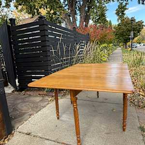 Solid maple Sheraton style dining drop leaf table 