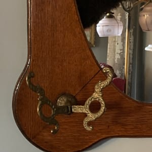 Turn of the century oak mirror with hooks 