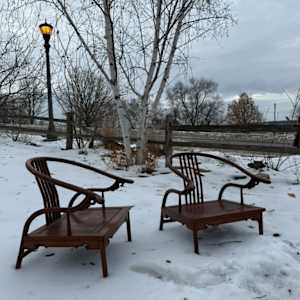 Pair of 19th century Chinese hardwood horseshoe low chairs 