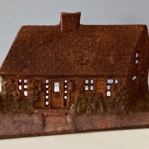 Vintage cast iron cottage door stop 