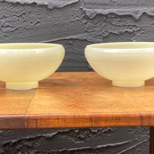 pair of custard glass globes 