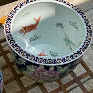 Chinese jardiniere with black with bright flowers