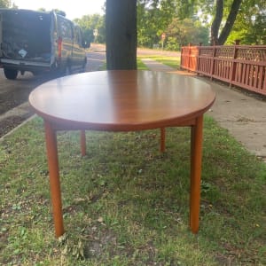 Danish modern teak dining table with 2 leaves 
