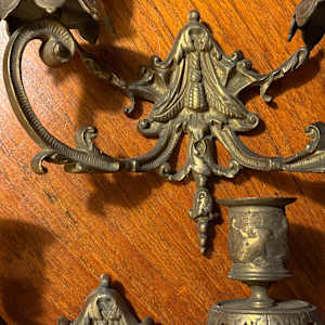 Pair of ornate brass wall mounted candelabra 