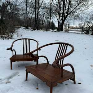 Pair of 19th century Chinese hardwood horseshoe low chairs 