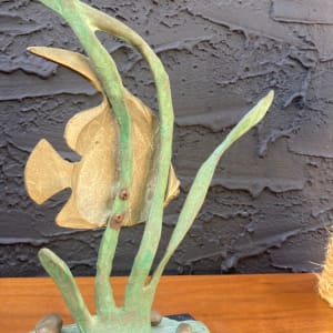 Fish sculpture on marble base 