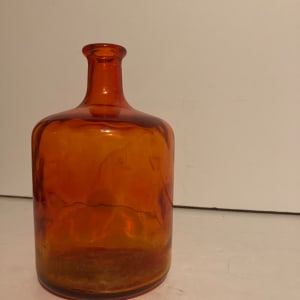 Blenko style orange bottle shaped vase 
