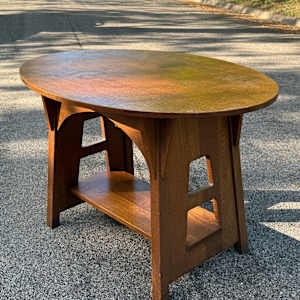 Limbert Mission oval table with cut outs 