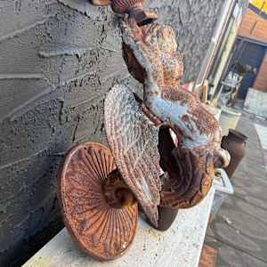 Cast iron garden wall mounted winged cherub 