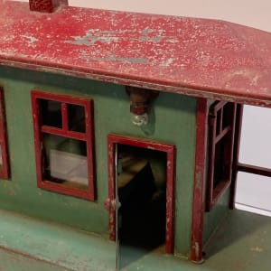 Folk art metal painted depot with lights 